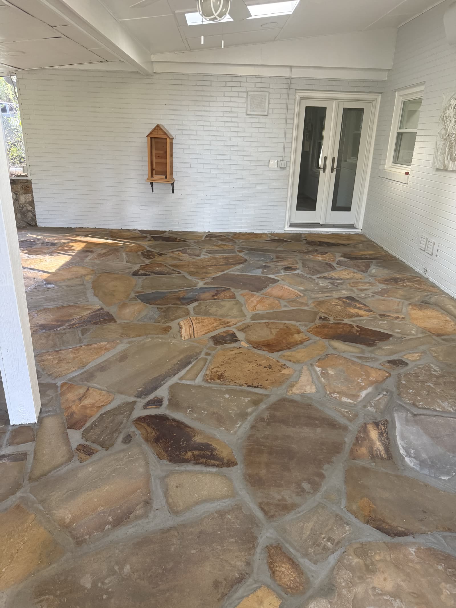 Hand-set flagstone floor on a covered porch with French doors, Chattanooga TN area