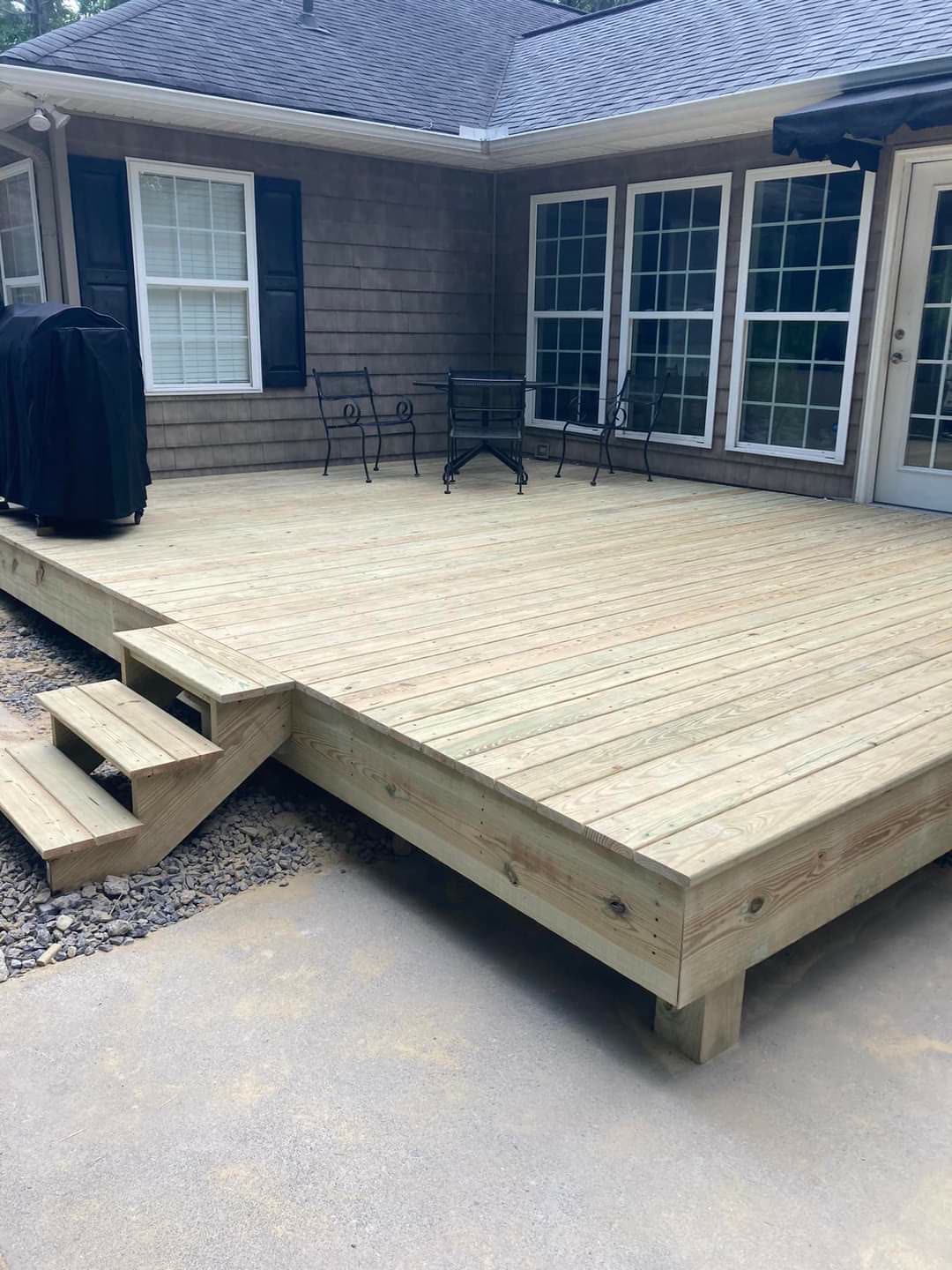 Ground-level pressure-treated deck with corner steps, Chattanooga TN area