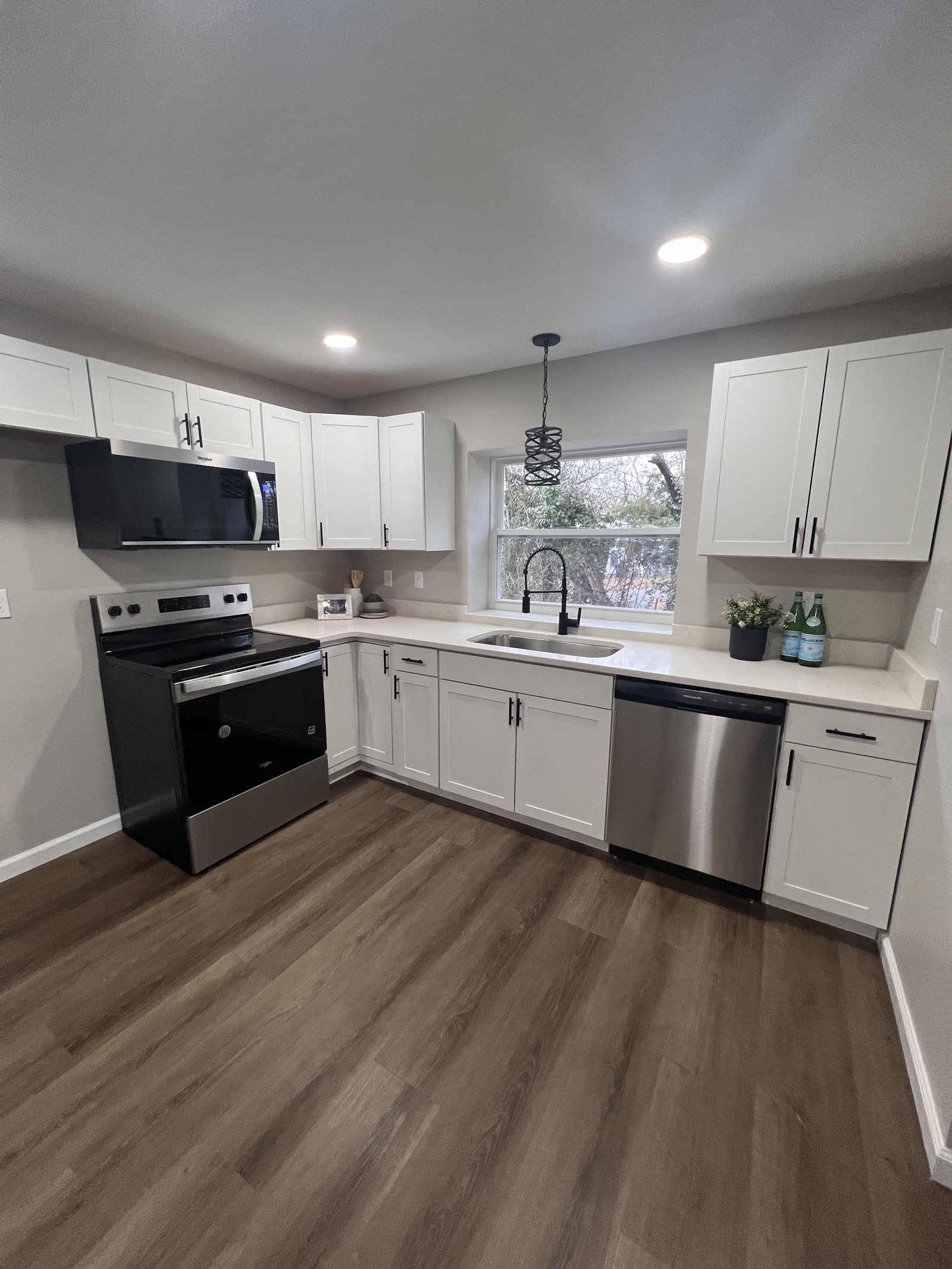 Kitchen remodel with white cabinets by Mountain City Pros, Chattanooga TN area