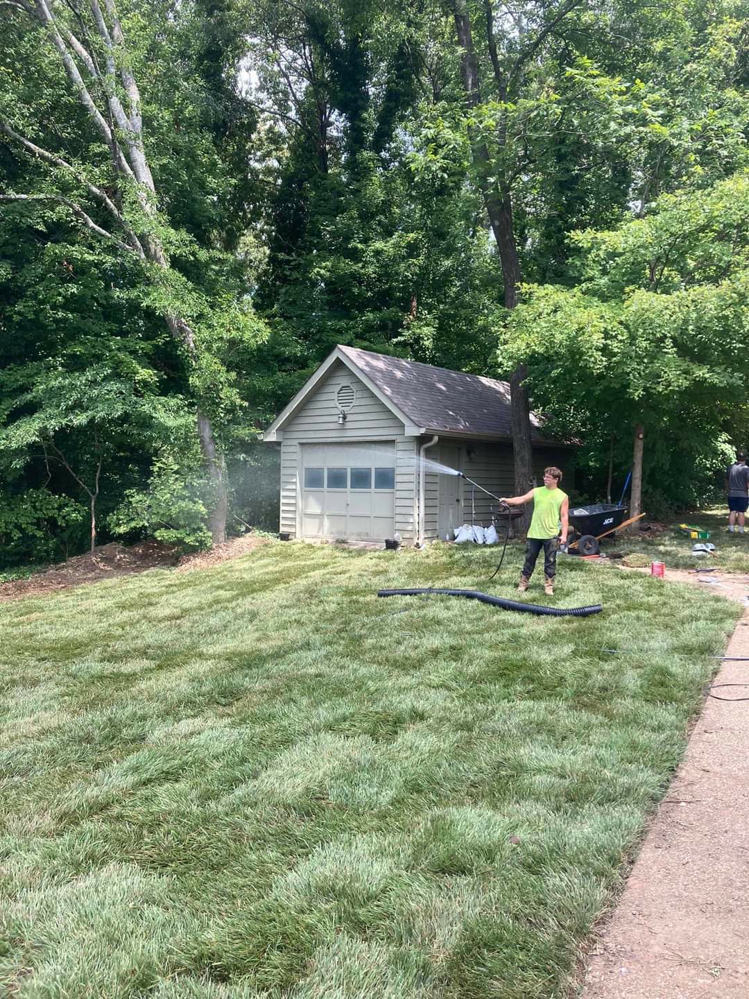 Newly installed sod lawn being watered in, Chattanooga TN area