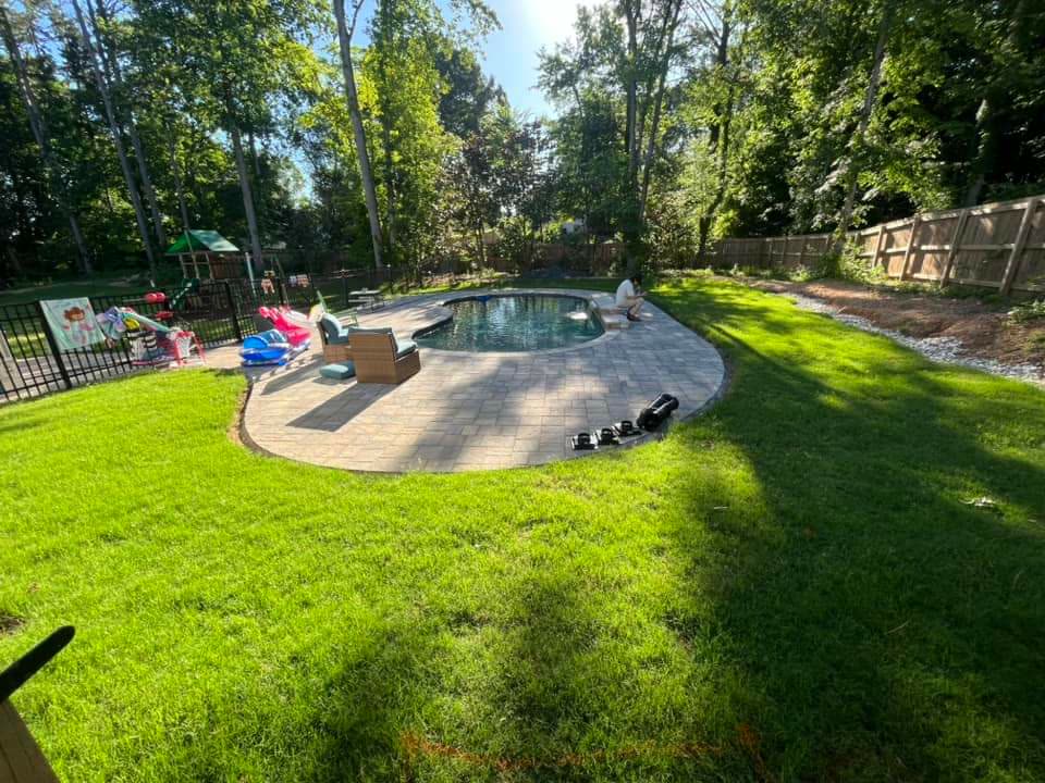 New sod lawn installed around a paver pool deck surround, Chattanooga TN area