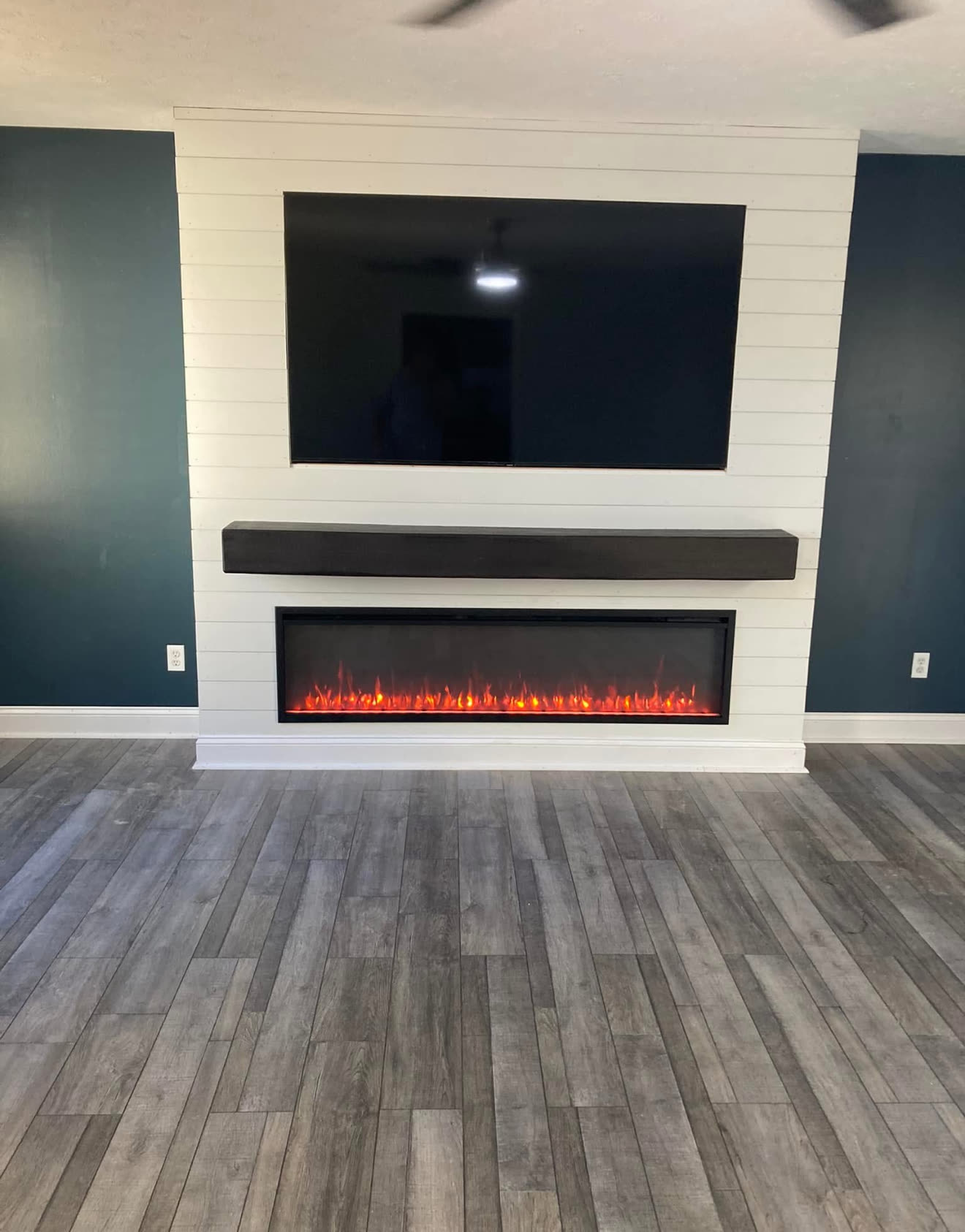 Shiplap fireplace feature wall with linear electric fireplace, timber mantel and mounted TV, Chattanooga TN area