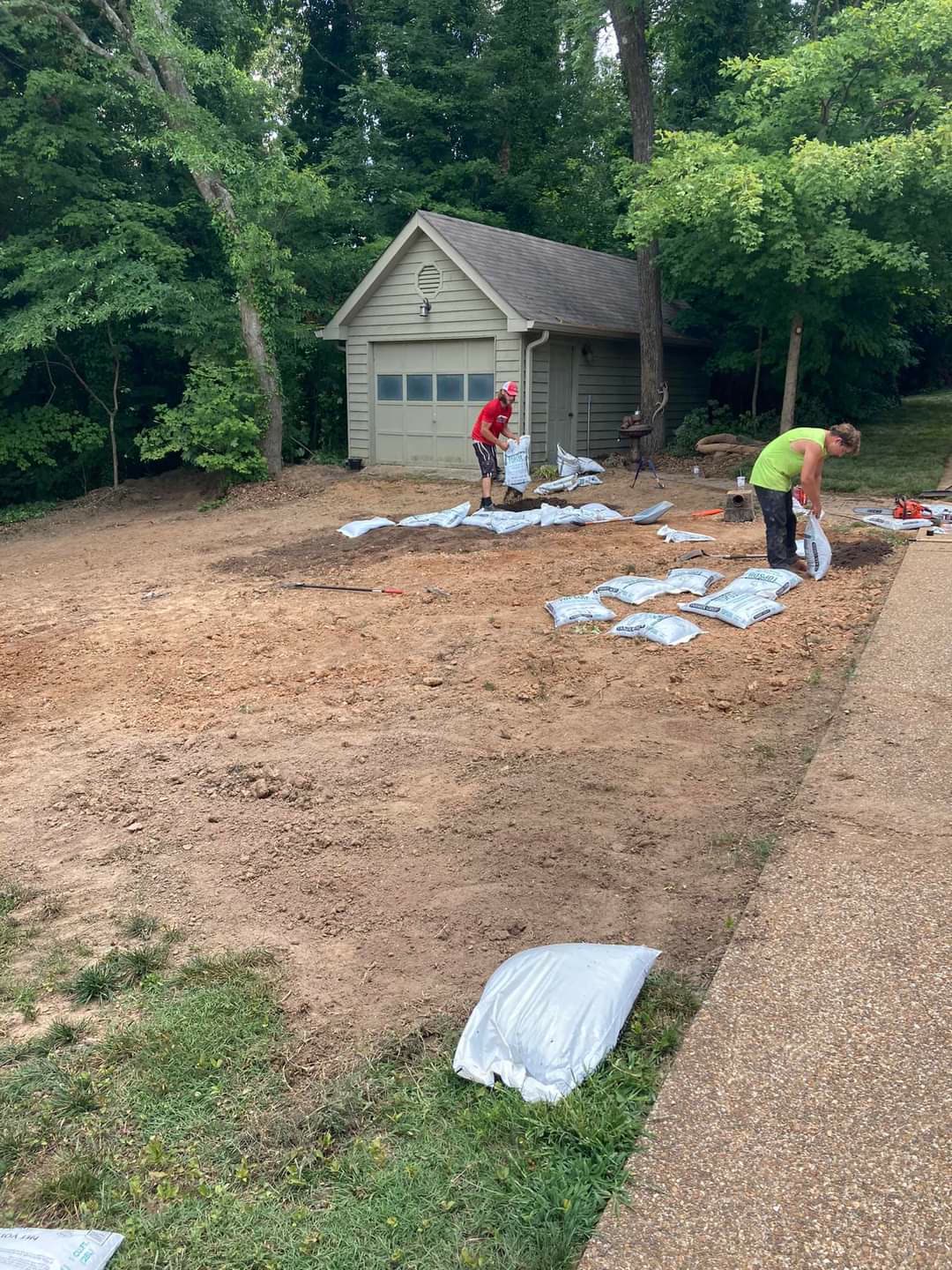 Topsoil spread across a graded yard before sod installation, Chattanooga TN area